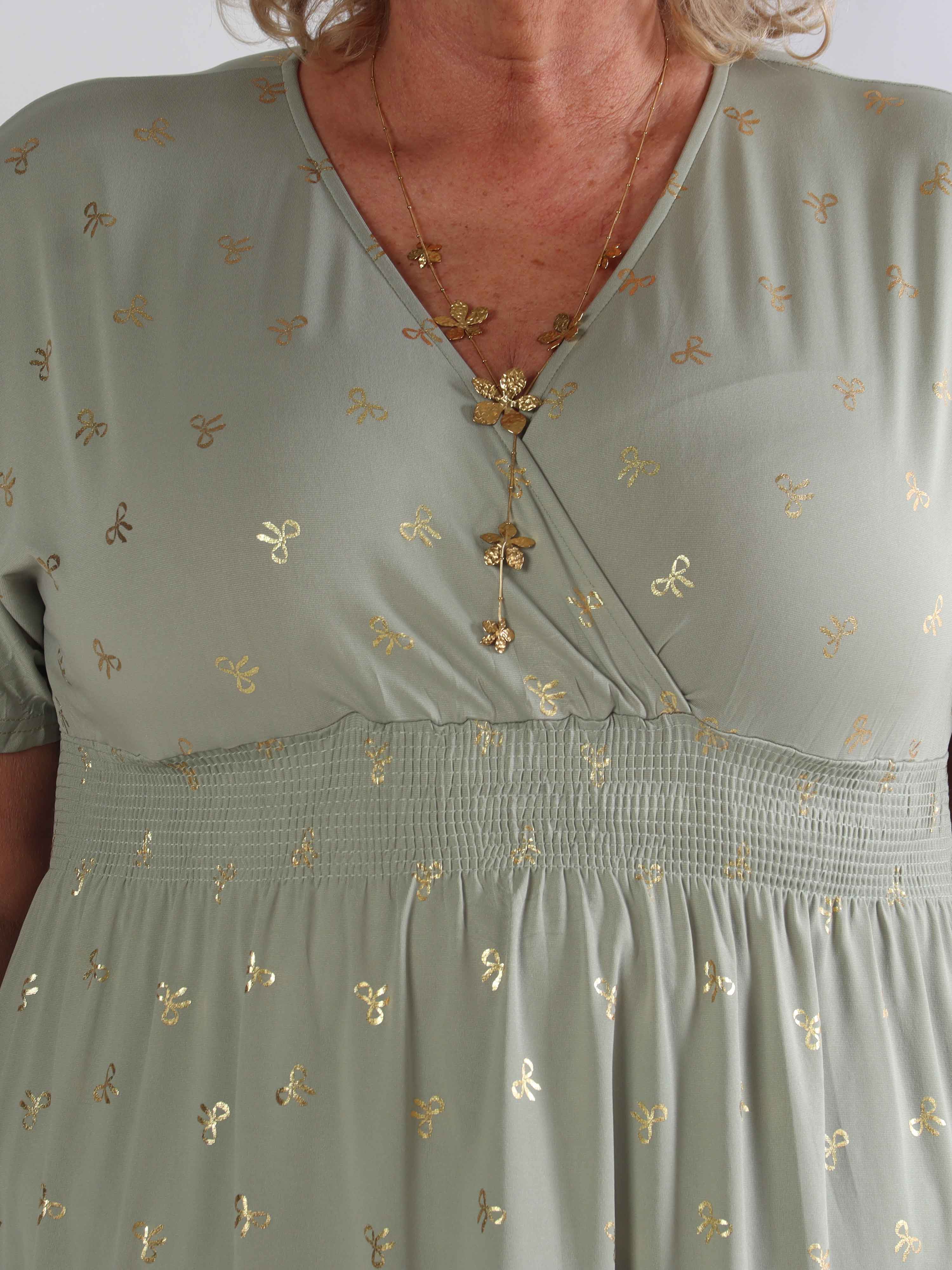 Pams Gold Bow Short - Plus size klänning med smockad midja och fina guldfärgade rosetter